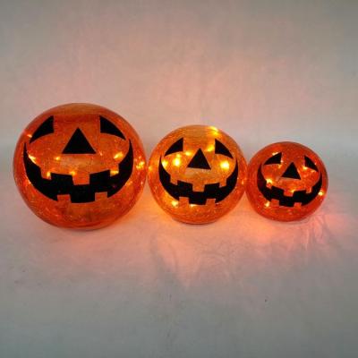 China Eco-freindly Pumpkin Pattern Ice Snowball Halloween Home Decorative Ornament Led Crack Glass Ball Ornament for sale