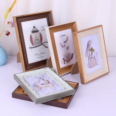 China Environment Friendly Vintage Wood Frame Table Top Or Wall Mount Solid Photo Frames for sale