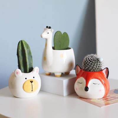 China Eco-Friendly Giraffe Plant Pot Kitty Ornament Animal Flower Decor Indoor Ceramic Tabletop Ceramic Planter for sale