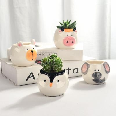 China Beautiful Small Traditional Animal Ceramic Flower Pot Succulents Planter Vase For Table Top for sale