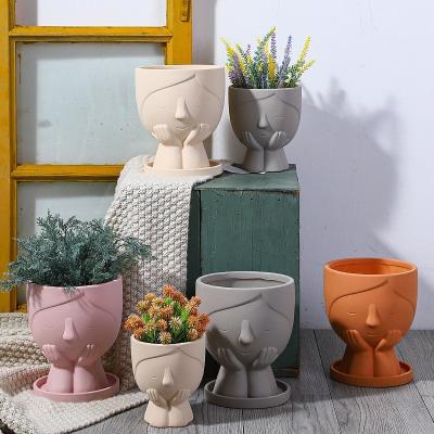 China OEM Contemporary Ceramic Plant Pot Cute Closed Eyes Face Cactus Planter Indoor Terracotta Flower Pot With Drainage Hole for sale