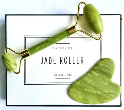 China Whitening Jade Hot Facial Roller Xiuyan Green Jade Roller Natural Stone Amazon Product Skin Care Tools for sale