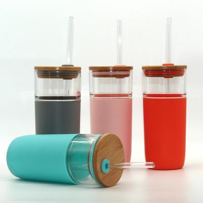 China Sustainable Silicone Sleeves Insulated Glass Water Tumbler Mugs With Wooden Lid And Straw for sale