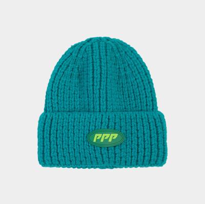 China COMMON Wholesale Winter Hand Knitted Hats New Brand Plain Beanie for sale