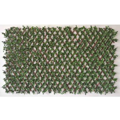 China Easy Easily Assembled and Quick to Install PVC Green Trellis Artificial Evergreen Leaves for Hotel for sale