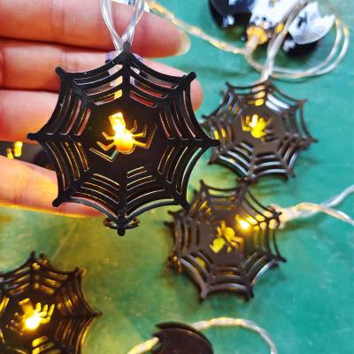 China Holiday Decorations Halloween Cobweb Light Decoration Plastic Led Spiderweb Stage Pendant Light Decoration for sale