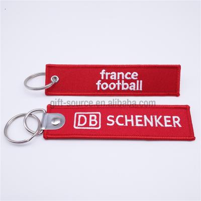 China Promotional Gift Personalized Logo Design Comfortable Keychain Custom Double Embroidered Key Flag for sale