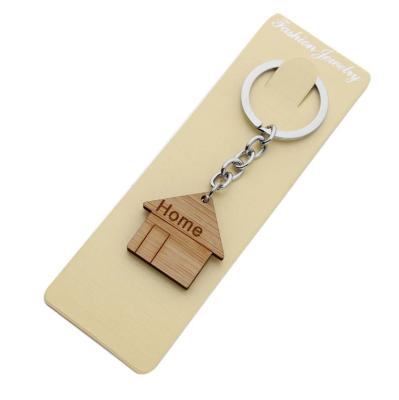 China Promotion Gift Display Wooden Key Chains For Women Men / Wooden Key Chain Rack Blanks Bulk To Engrave Design for sale