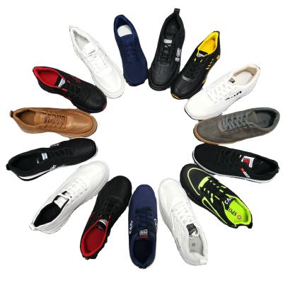 China Fashion trend overstock spell clearance shoes walking running shoes men's sports running style casual shoes for sale