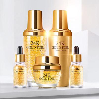 China Stocked 24K Gold Skin Care Sets Moisturize Shrinks Plump Anti Wrinkle Toner Face Cream Essence Facial Sets for sale