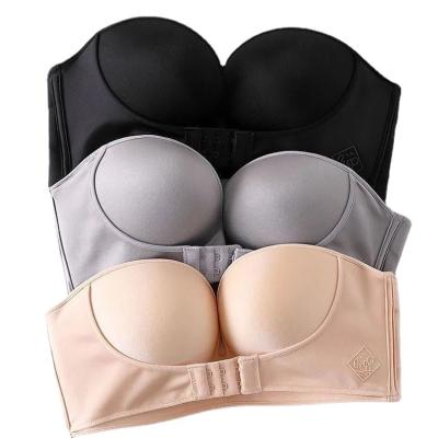 China Dropshipping Front Closure Lnvisible Small Breast 32 Wireless Front Buckle Lift Sexy Women Thick Cup One-Piece Waist Lift Strapless Bra for sale