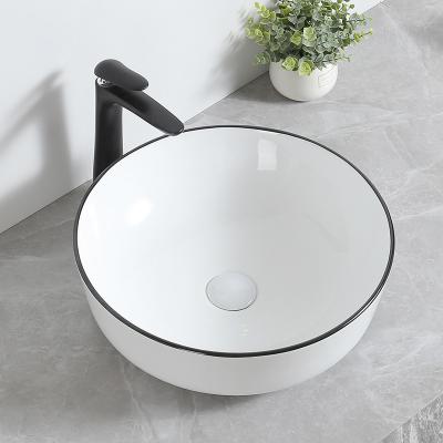 China Modern White Color Modern Hotel Countertop Bathroom Sink Ceramic Face Art Hand Wash Basin for sale