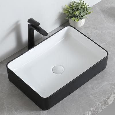 China Hot Selling Modern Unique Design Ceramic Lavatory and Wash Hand Basin Holder for sale