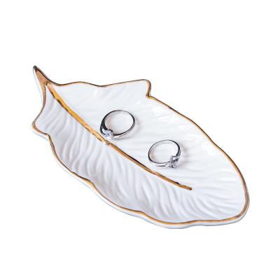 China Viable Factory Style Ceramic Dish Custom Nordic Creative Feather Opens Jewelery Dish Pastry Fruit Dish Jewelry Storage Ring Plate for sale