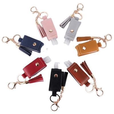 China 2021 New Arrival Personal Hand Sanitizer Bottle Leather Case 30ml PU Skin Care Empty Hand Sanitizer Bottle With PU Tassel Key Chain for sale