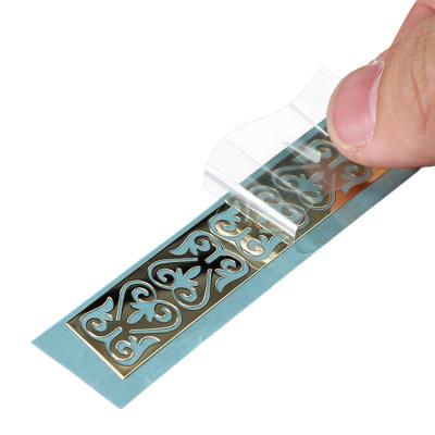 China Quality Assurance Waterproof High Productivity Enhanced Gold Sticker Adhesive Gold Foil Stickers Label for sale