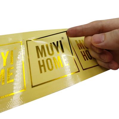 China New hot stamping waterproof custom listing product clear gold foil sticker waterproof custom printing gold foil stamping sticker for sale