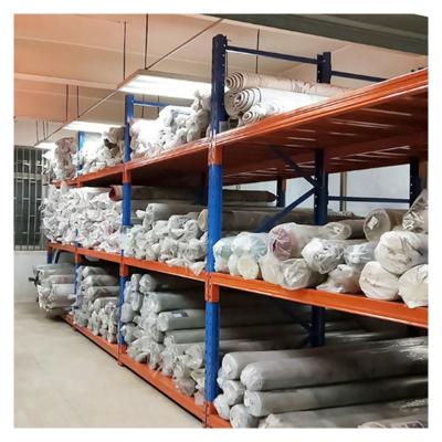 China Corrosion Protection Customized Good Price Professional Heavy Duty Warehouse Textile Fabric Rolls Block Metal Storage Rack for sale