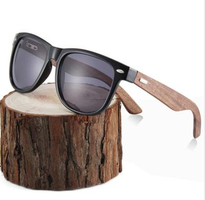 China 2023 new arrival temple logo wooden sunglasses fashion sunglasses plastic walnut frame custom elegant for sale