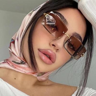 China NWOGLSS Environmentally Friendly 31274 2023 New Arrival Women Glass Rimless Luxury Sunglasses for sale