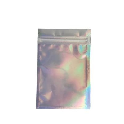 China Moisture Proof In Stock And Custom Zip Lock Light Pink Holographic Plastic Bag Package Bags Resealable Iridescent Pouches for sale