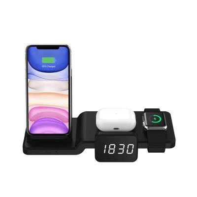 China 2021 Best-selling Qi Timess Amazon 5 in 1 Wireless Charging Stand with Time Display for Watch Series 6 5 4 3 2 1 Earphone for sale