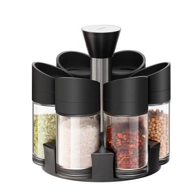 China Viable Kitchen Spice Container Glass Seasoning Salt Shaker Pepper Jar Spice Jar With Rotating Rack for sale