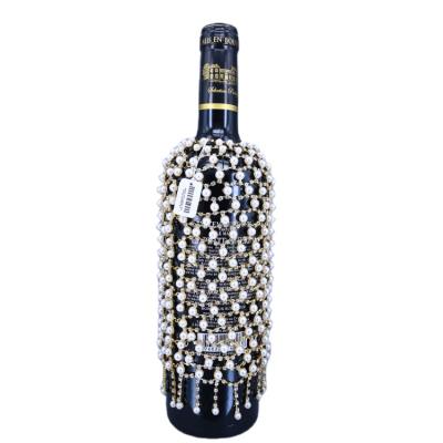 China Unique Party Glass Bottle Cover Red Wine Party Pearl Rhinestone Wine Bottle Decoration for sale