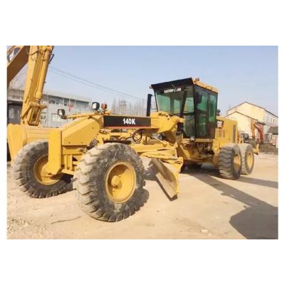 China Building material stores used Caterpillar wheel motor grader CAT 140k for road racing in good condition, cheap price, made in Japan for sale