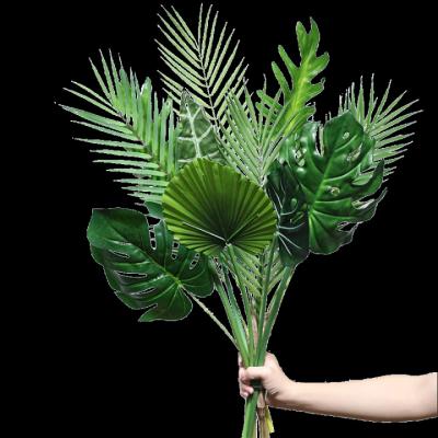 China Eco-friendly Tropical Leaves Decorations Green Artificial Plastic Green Palm Leaf For Gre-fernbedienung for sale