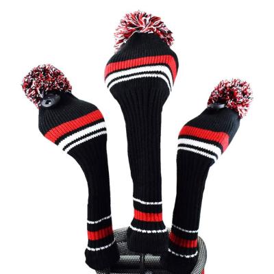 China Wooden Golf Club Dust Wrap Covers Customized Creative Black And Red Stripes Wooden Pom Pom Golf Club Head Covers Waterproof Knitted Golf Headcovers for sale