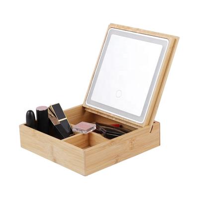 China Small Quantity Acceptable New Style Rechargeable Sensor Touch LED Three Colors Adjustable Bamboo Square Storage Box Portable Makeup Mirror for sale