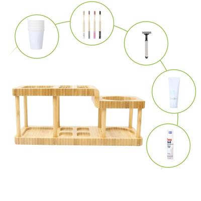 China Sustainable Eco-friendly Bamboo Multifunctional Toothbrush Holder Bathroom Accessories Set Storage Rack Fruit Squeezer for sale