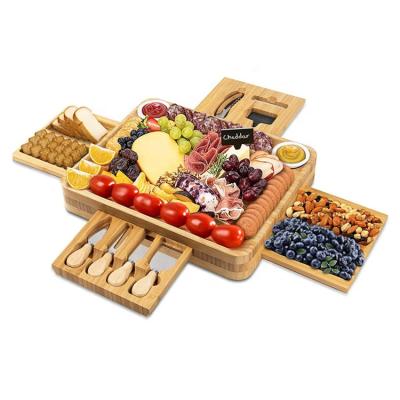 China Sustainable Wholesale Bamboo Wooden 4 Drawer Charcuterie Magnetic Cheese Board Slide- Set With Ceramic Cutlery Bowls And Knife for sale