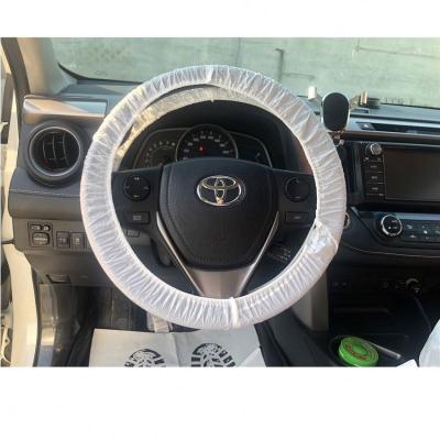 China Basic without the headspace cheap high quality disposable white plastic transparent car design color steering wheel cover for sale