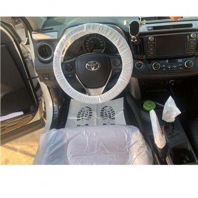 China Basic Without Design Cheap Disposable Car Wheel Cover Protector Hot Selling Plastic-elastic Steering Cover For Car Automobile for sale