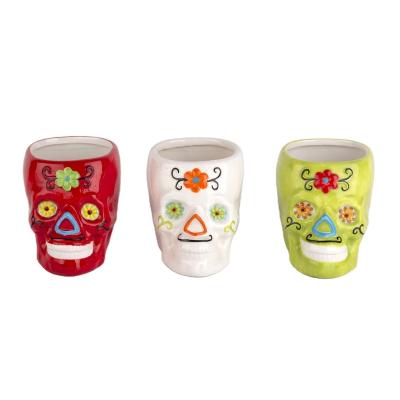 China Wholesale High Quality Custom Logo Modern Red And Green White Skull Decal Head Shape Glazed Ceramic Flower Pot For Indoor for sale