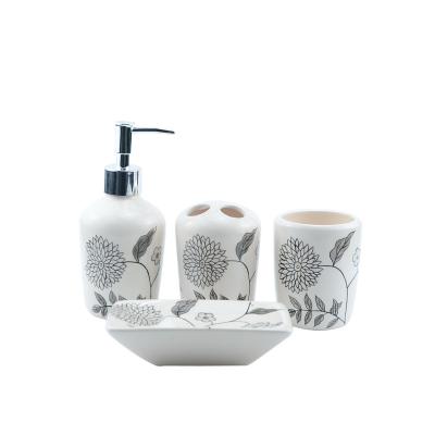 China Viable Chinese Glazed White Luxury Custom 4 Pieces Decal Flower Pattern Bathroom Accessories Set For Home Bathroom for sale