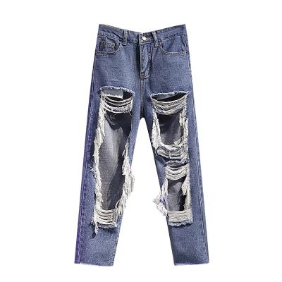 China Fashionable QUICK DRY Denim Hole Jeans Loose Cropped Women Ripped Wide Leg Pants for sale