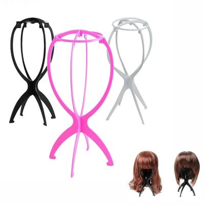 China Wig Hair Display Making Wigs Plastic Wig Stand Tripod Hot Wig Stand Display Stand Tripod Wig Stand for sale