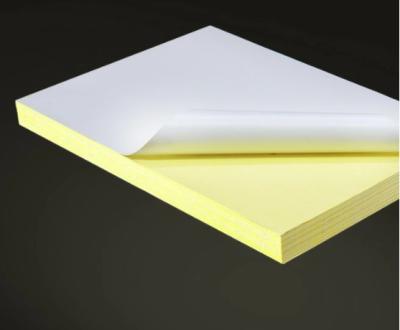 China 70*100cm 80gsm cast coated sticker water base bottom 90gsm yellow release paper back slit for sale