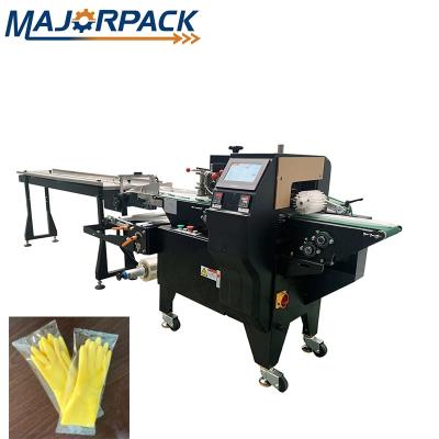 China Full Automatic Home Food Use Glove Flow Packaging Machine With CE ISO Certification for sale