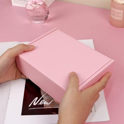 China High Quality Custom Logo Print Perfume Paper Packaging Materials Box Pink Recycled Corrugated Cardboard Mailing Box for sale