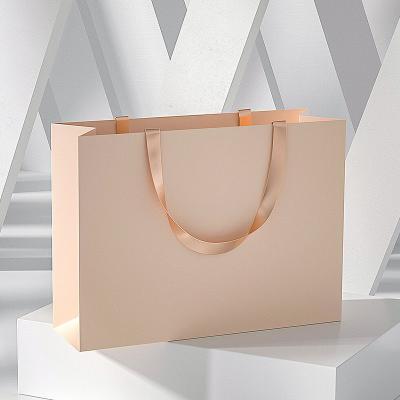 China Recyclable High Quality Paper Bags Customized Logo Design Luxury Gift Shopping Bags With Ribbon Handle for sale