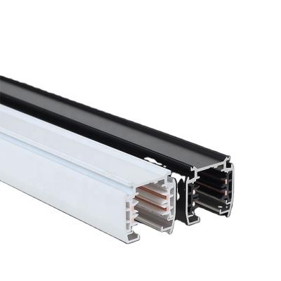 China Modern white and black track lighting system can be customized 4 phase 4 wire led track rail and track light accessories for sale