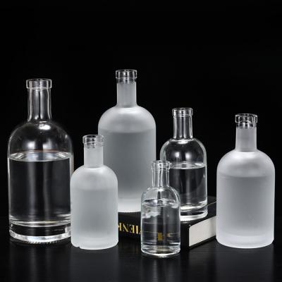 China Beverage Customize 375Ml 500Ml 750Ml 1000Ml Empty Clear Round Glass Vodka Liquor Bottle For Whiskey Rum Tequila Vodka Liquor Winesupplier for sale