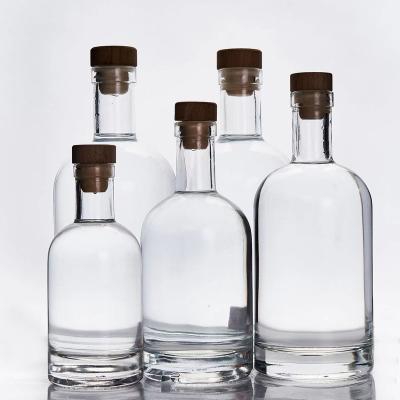 China Beverage Xingda Customized 100Ml 200Ml 375Ml 500Ml 700Ml 750Ml 1000Ml Clear Empty Glass Bottle For Vodka Liquor Wine With Corksupplier for sale