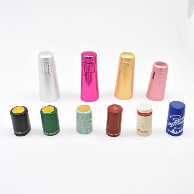 China Xingda Pilfer-proof Customize Aluminum Foil Shrink Cap For Wine Bottle Heat Shrink Cap PVC Shrink Caps Suppliers for sale