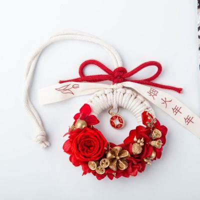 China Natural flowers New Design Professional Christmas Garlands Wreaths Door Hanging Rattan Dried Flower Garland For Decoration for sale