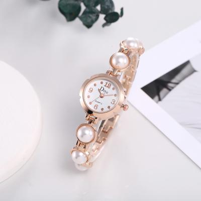 China Other small-cap size explosive ladies watch Korean fashion alloy wish star simple digital ladies watch for sale